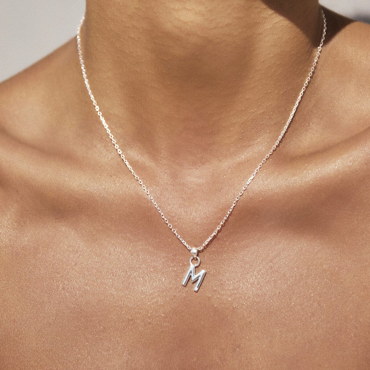 Arms of Eve - Letter S Silver Charm Necklace