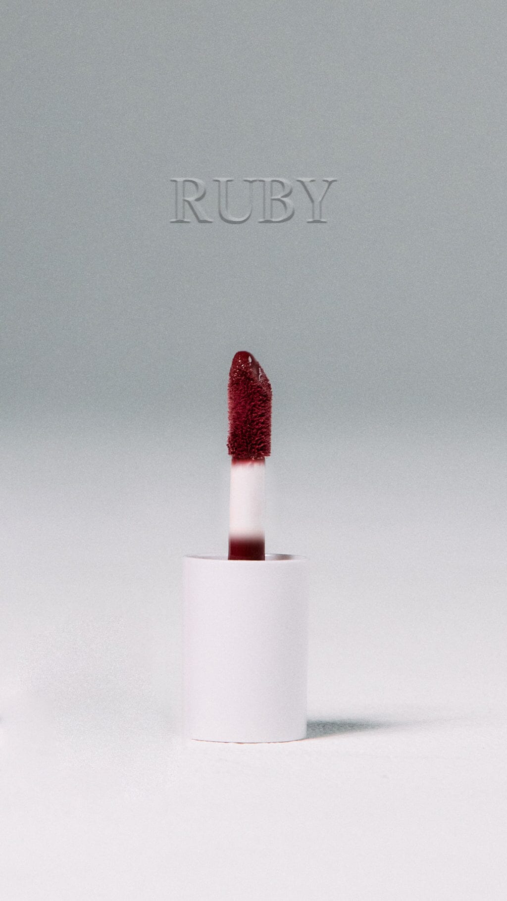 SŚAINT Lip Gloss in Ruby