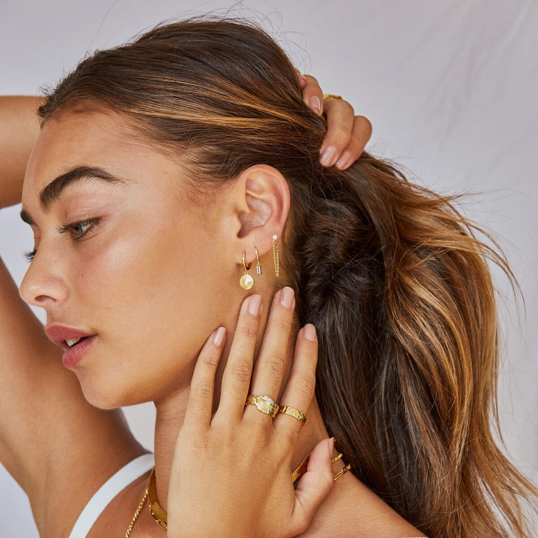 Arms of Eve - Protective Eye Gold Hoop Huggies