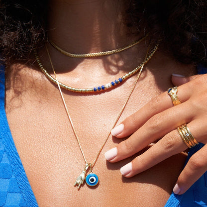 Occhio Gold Charm Necklace  Arms of Eve